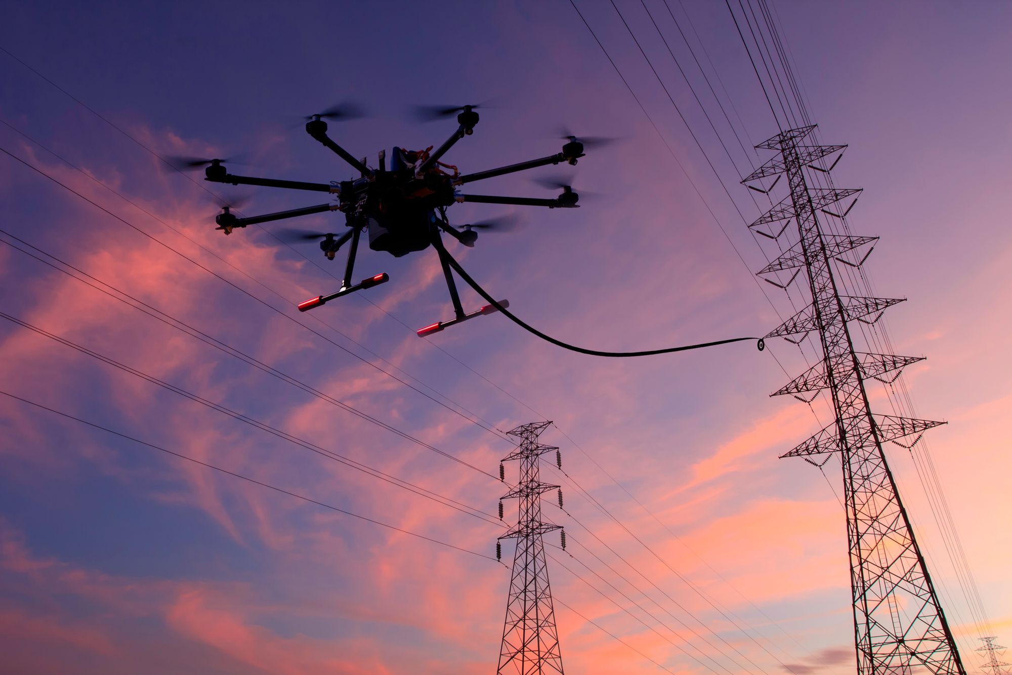 Using Drones to Maintain Power Transmissions to the Community